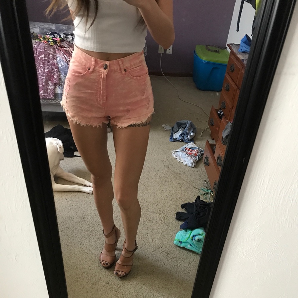 Orange acid wash denim shorts